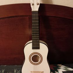Small White Acoustic Guitar.
