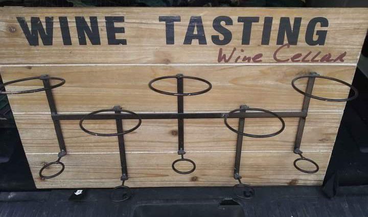 Sign That Holds Wine