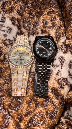 Two watches one Rolex one regular perfect condition no papers no box just the watch 150 for the gold 1000 for the Rolex retail price on online is 1000