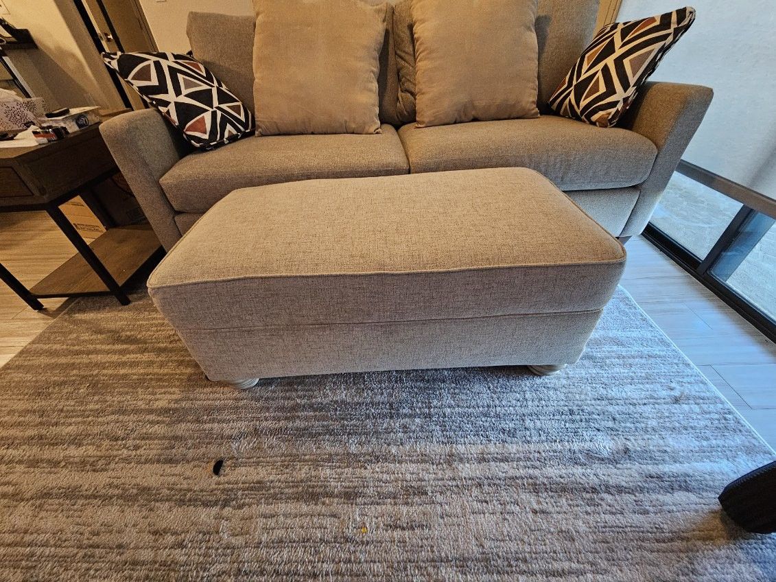 Beige Couch And Ottoman