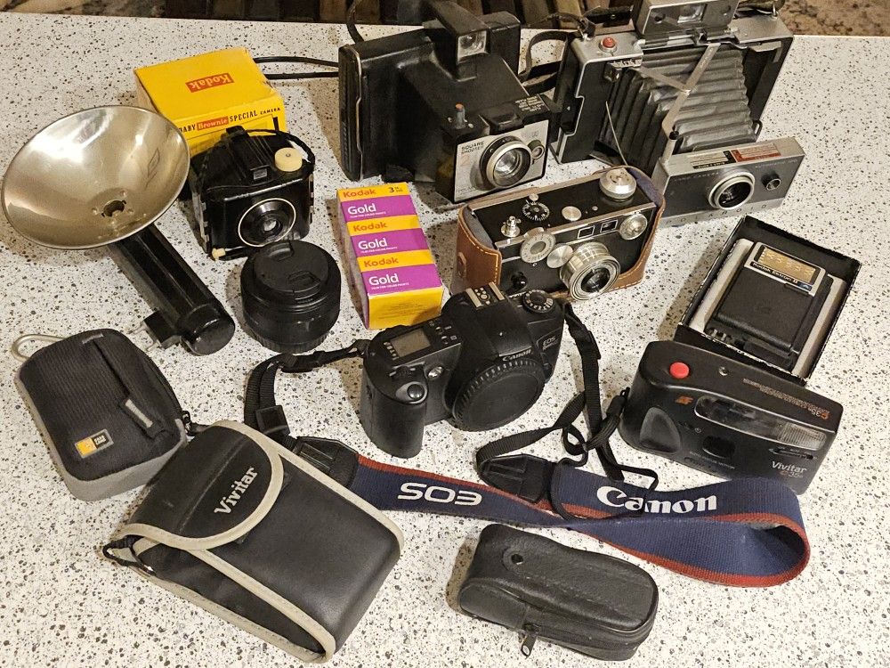 Prices in Description - Cameras and Accessories