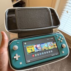 Nintendo Switch Lite with 5 games and case