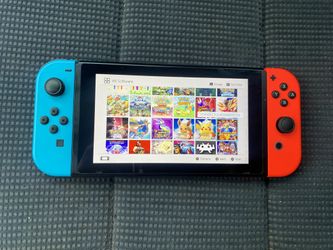 NINTENDO SWITCH V2 with 120 SWITCH GAMES and 7500 Old School Games