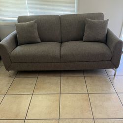 Gray Couch In Good Condition With 2 Pillows