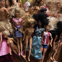 Lot Of 28 Barbie’s And Ken’s.  Lots Of 90s Included. 