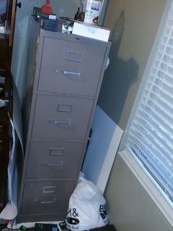 Filing cabinet 2 feet deep. Works perfect!
