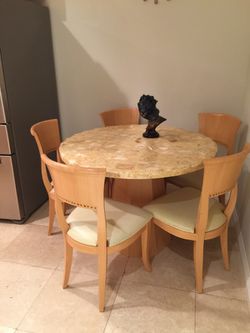 Very unique, high quality, real marble table with 5 chairs. Perfect for a breakfast nook. Beige / maple