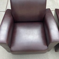 Pair Of Leather Armchairs
