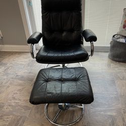 ***REDUCED***Very Nice Leather Swivel Recliner With Ottoman