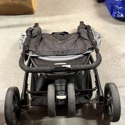 Car Seats And A Stroller