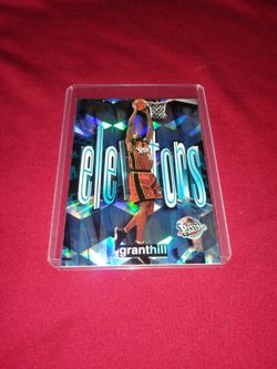 Near Mint 1999 Grant Hill Basketball Card - Fleer Showcase Elevators #5