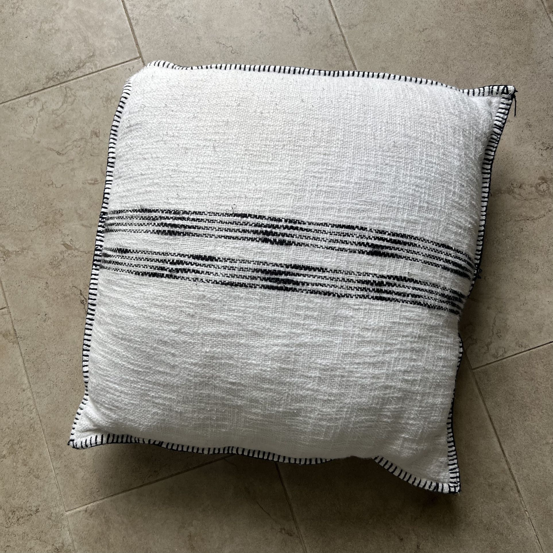 Oversized white and black stripe throw pillow