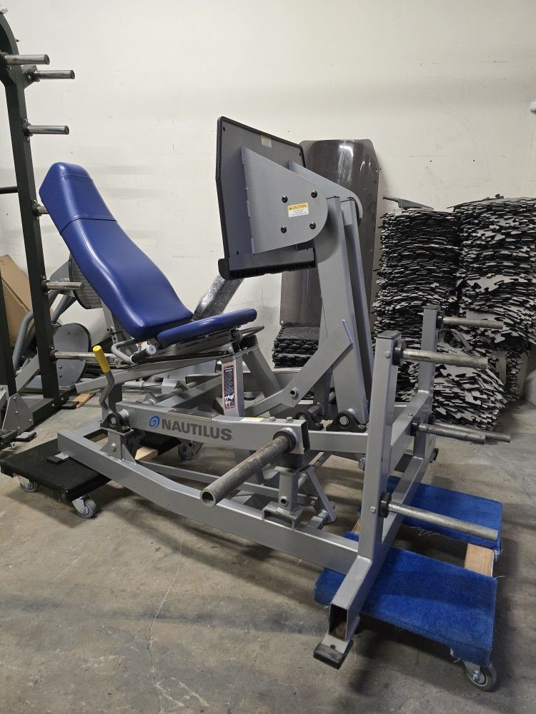 Nautilus xpload seated leg press workout fitness plate loaded gym equipment exercise