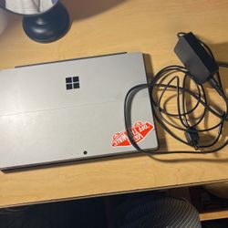 Microsoft Surface Pro And Charger 