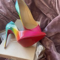 Louboutin - Red Bottoms 