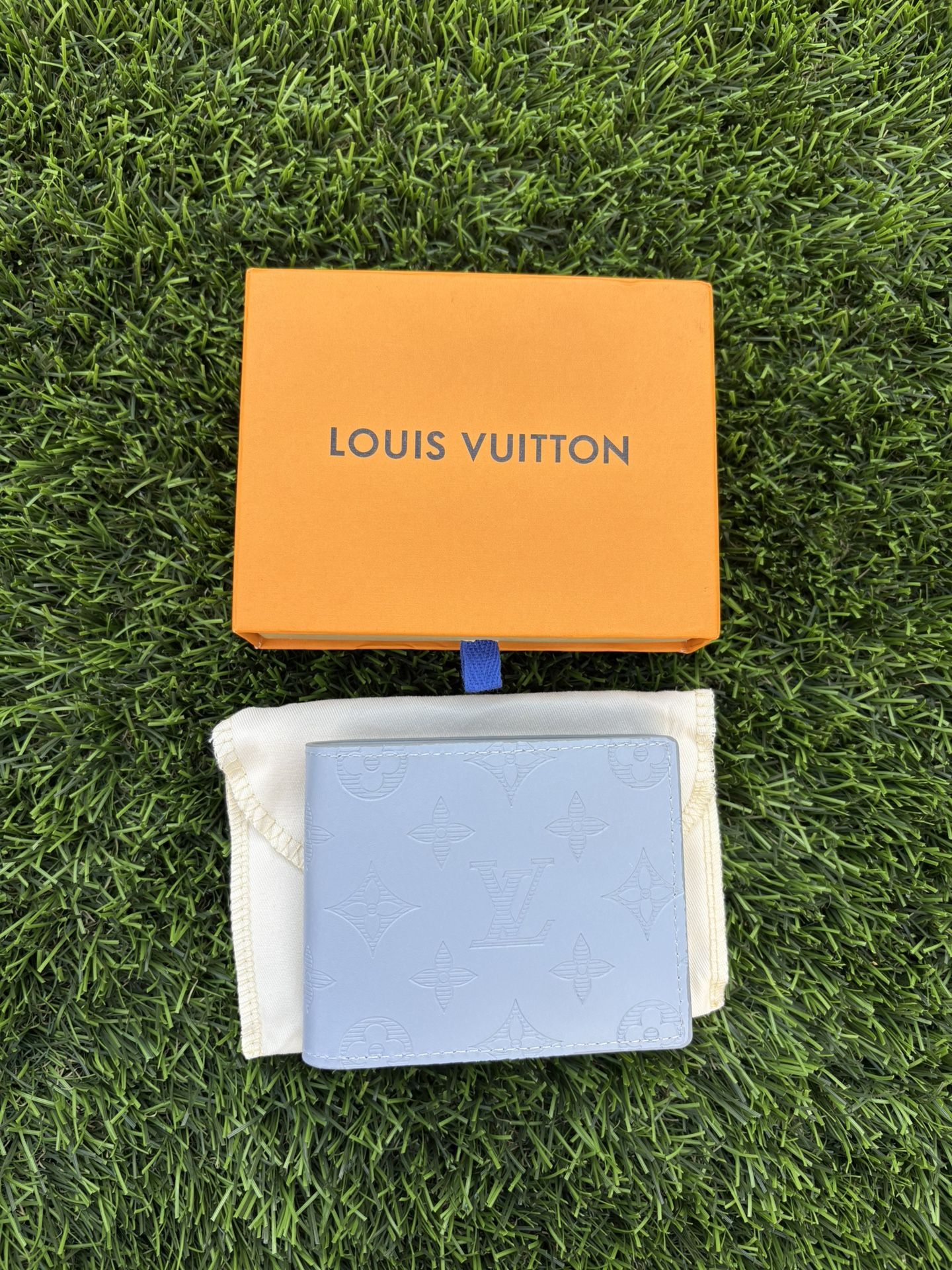 Louis Vuitton Multiple Wallet Light Blue Monogram Embossed Leather