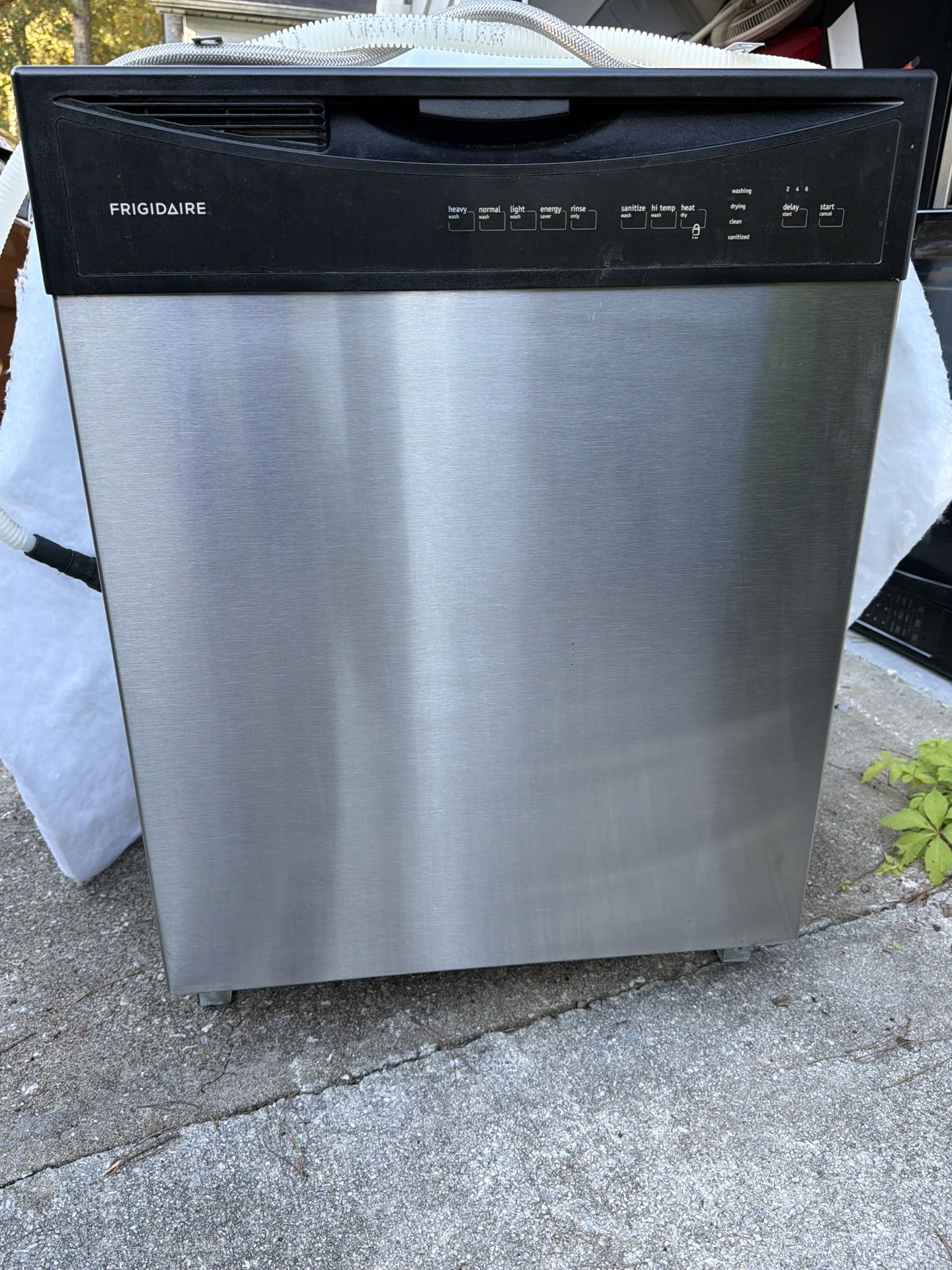 Stainless And Black Dishwasher And Microwave