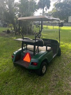 EZGO 2-Seater Golf Cart – 48V Lithium Batteries – New Tires – $2,500
