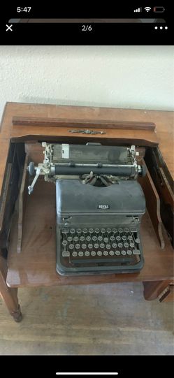 Royal antique typewriter with rolling desk