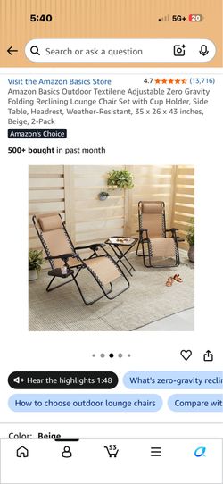 Two lounge chairs with matching table