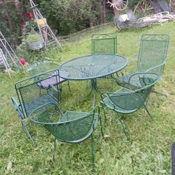 Wrought Iron Table With Six Wrought Iron Chairs