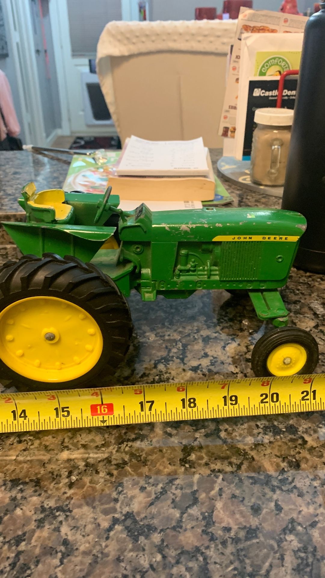 Vintage die cast John Deere tractor and vintages square hay baler attachment