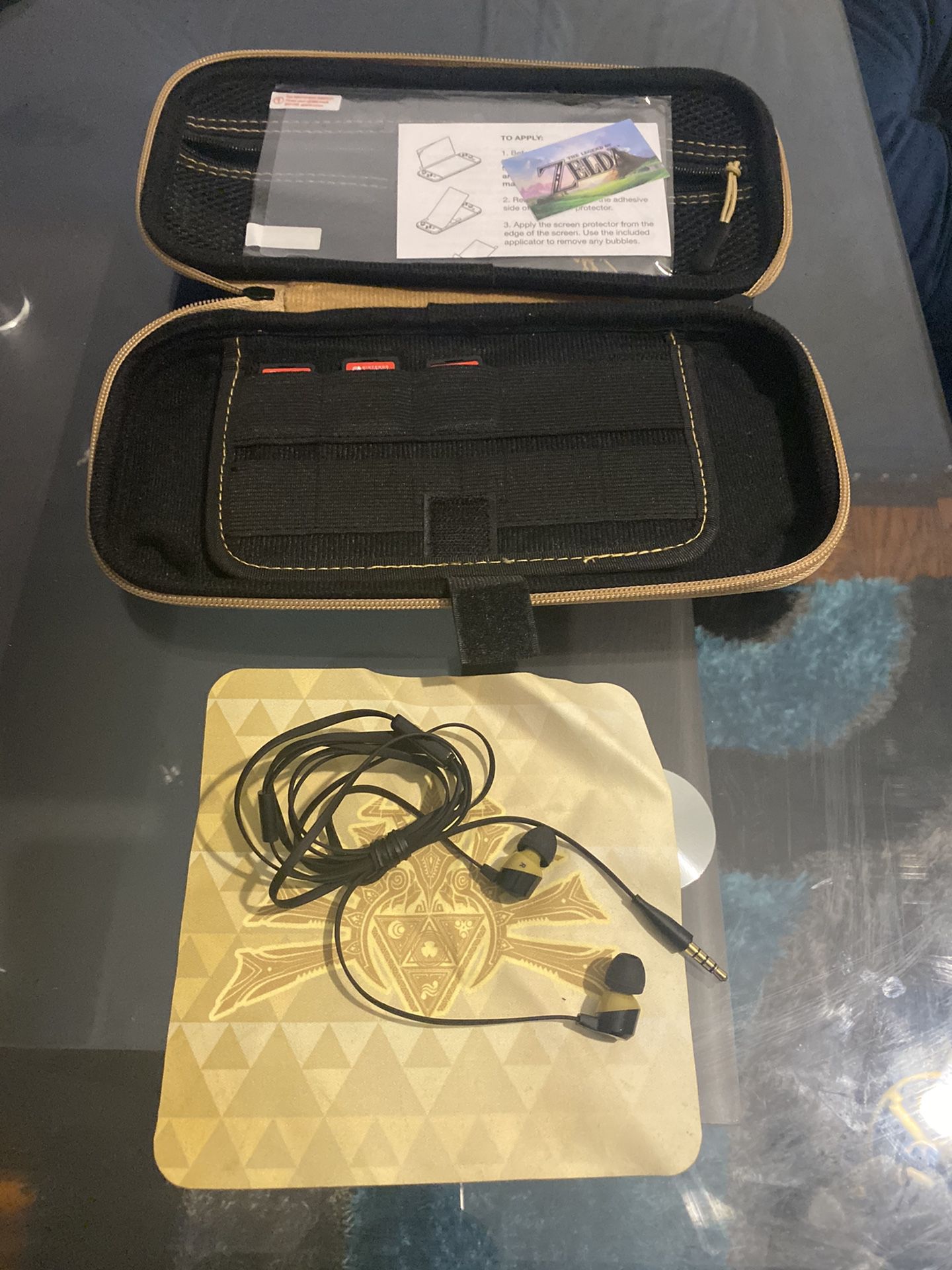 Nintendo switch with 3 games and Zelda case ,headphones and screen protecter