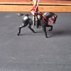 Vintage Red Coat Cast Iron ,1 Hand  Moves ,up And Down..