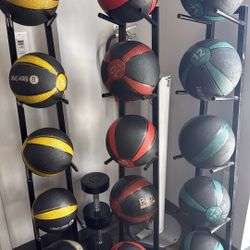 Medicine Balls, Water Rowers And Dumbbells