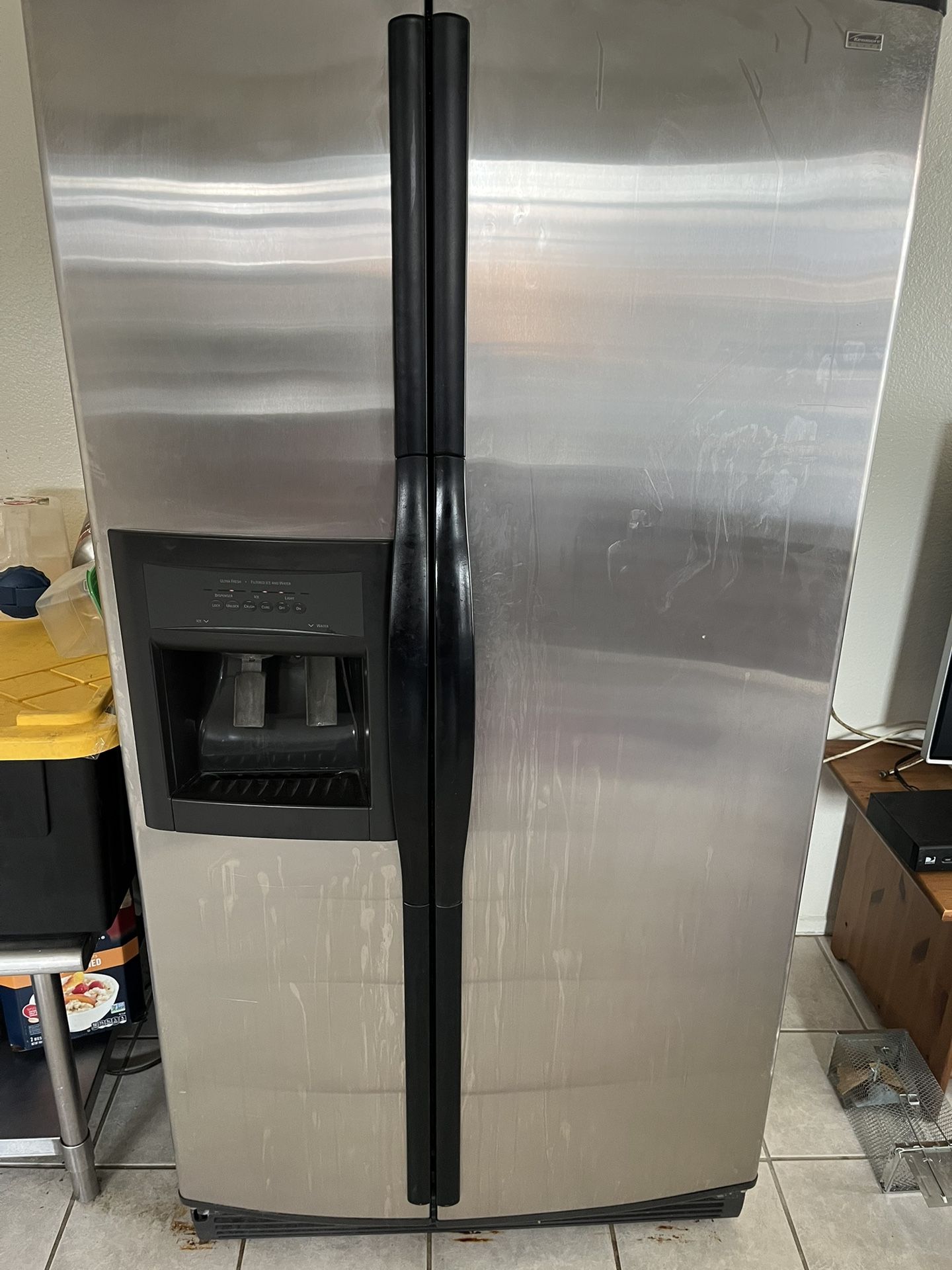 Whirlpool side-by-side stainless steel fridge selling for $155