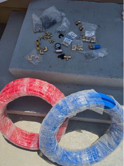 PEX B water line red and blue 75ft rools and assorted parts