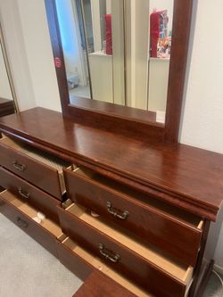 Serious buyers only. Cherry Finish Wood Dresser with Six Drawers $85
