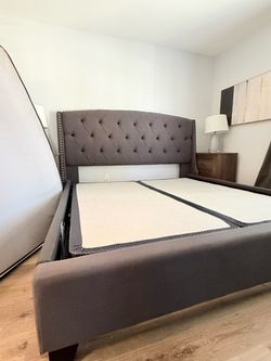 Cal King upholstered bed frame in great condition