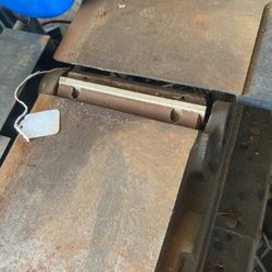 Craftsman wood planer with a cutting width of approximately 12 inches.