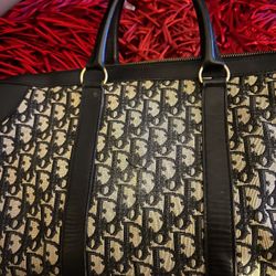 Signature Christian Dior Purse With Black Leather Trim 