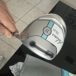 Adams blue ladies driver in right handed 12 deg / graphite shaft with original head cover , new item with original plastic wrap  See pictures for deta
