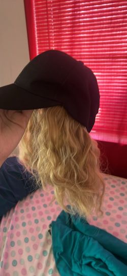 A black hat with a wind attached to it. It’s really awesome. I’m pretty.