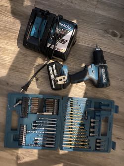 Makita Drill With Charger And Bits 