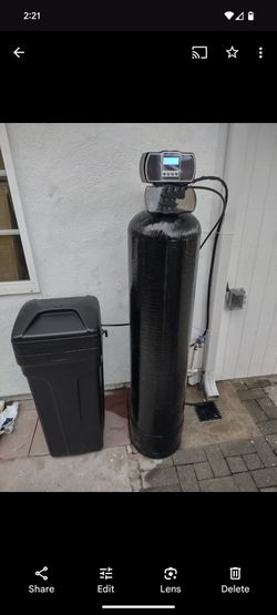New water softener with warranty and setup.