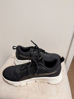 Puma Black and Gold Sneakers