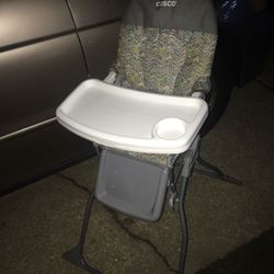Very nice fold up high chair only $30 firm