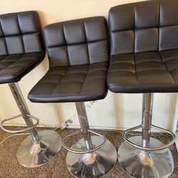 3 Leather Swivel Bar Stools- $135