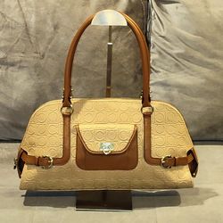 SALVATORE FERRAGAMO BEIGE & BROWN LEATHER GANCINI LOGO EMBOSSED LEATHER ZIP SATCHEL WITH SILVER TONE HARDWARE FRONT CLASP POCKET