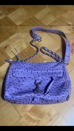 Charming Charlie very soft faux leather with beautiful lining and accents. Lavender in color