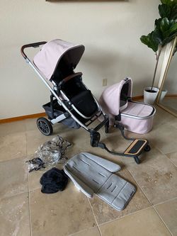 Uppababy Cruz V2 Stroller With Bassinet And Piggyback Board Pink