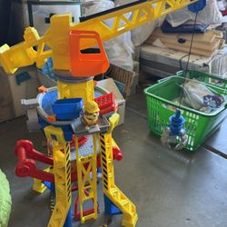 Rubble And Crew Crane Tower, And Hardhats