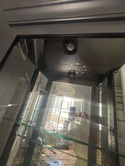 Vitrina de vidrio y espejo