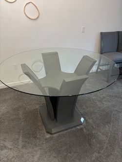 Round Glass Top Dining Table and 4 chiars