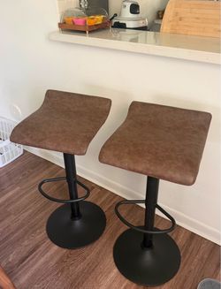 Set of 2 adjustable brown leather bar stools