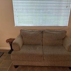 Tan Loveseat